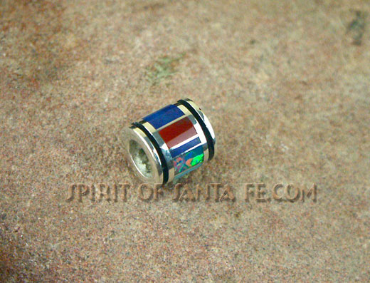 Navajo silver bead that is hand inlayed with Sleeping Beauty Turquoise, Lapis, mother of Pearl, Malachite, Red and Orange Spiny Oyster Shell.