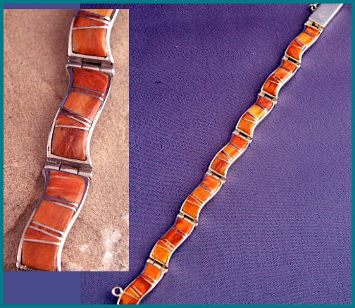 Silver rare wave design link bracelet with Red and Orange Spiny Oyster shell