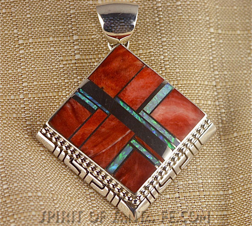 Navajo Silver Pendant inlayed with Red and Orange Spiny Oyster shell and cultured Opal